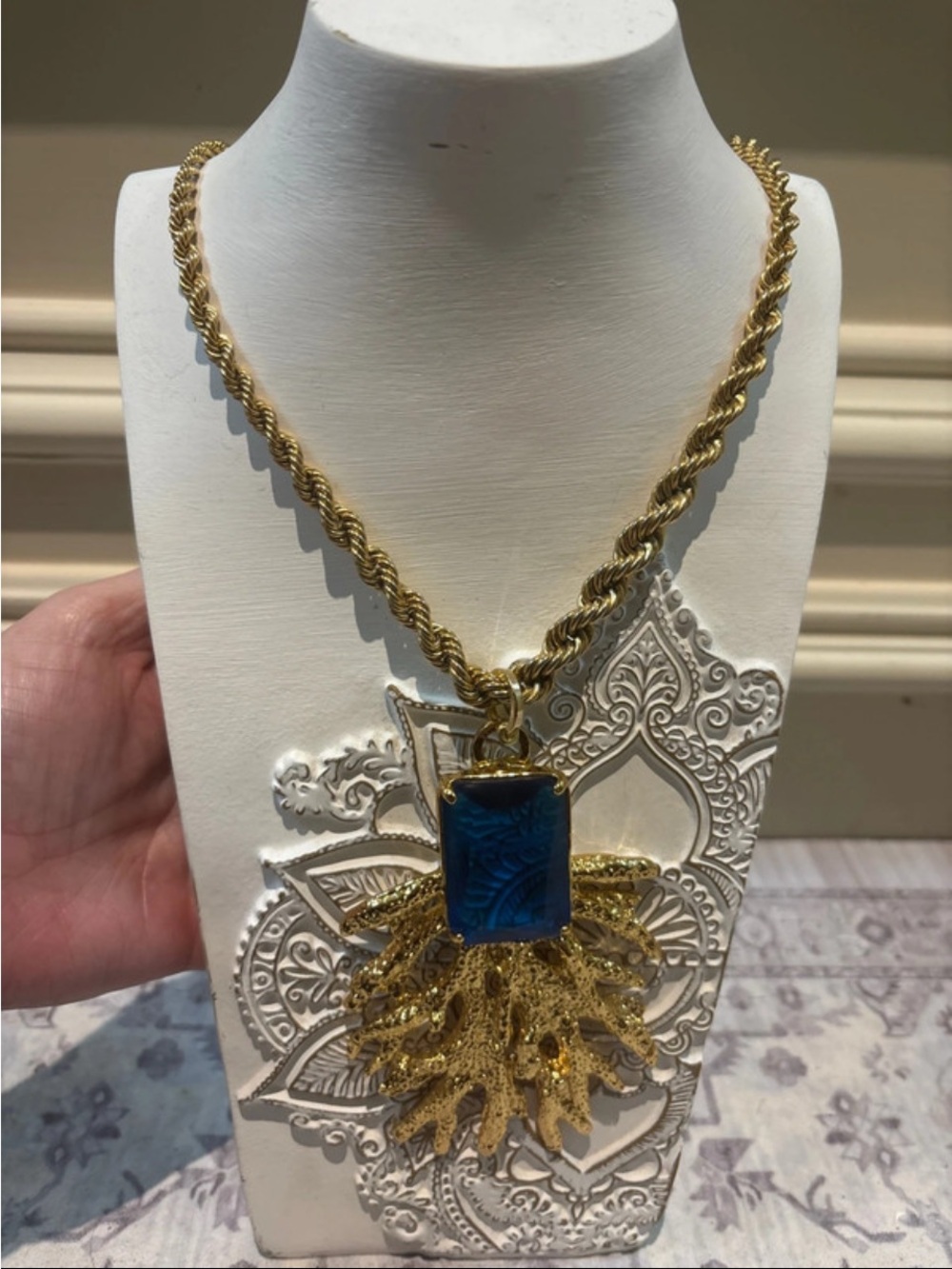 Trina Turk Gold Rope Necklace with Blue Rectangular Pendant and Gold Tassel